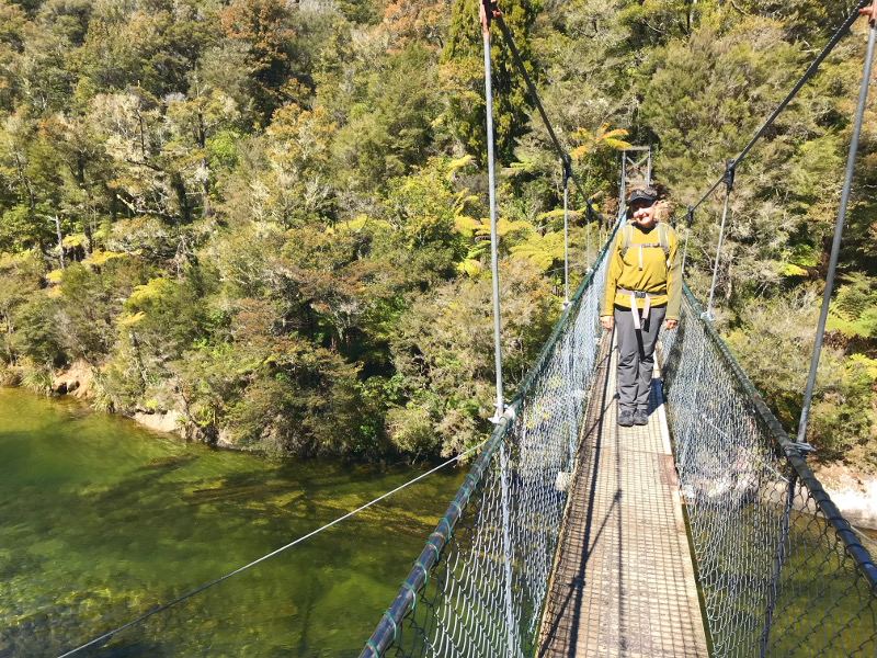 Mary on a swing bridge in Abel Tasman National Park